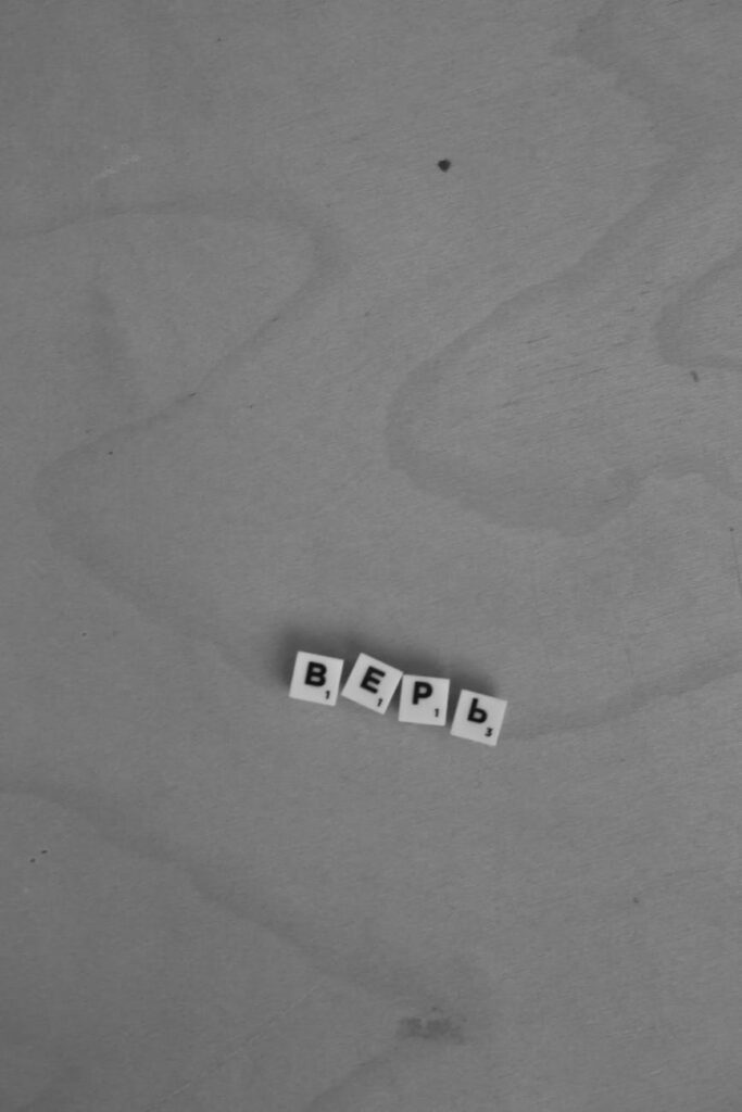 Massive golden Reclining Buddha statue inside ornate Wat Pho temple, Bangkok, Thailand.