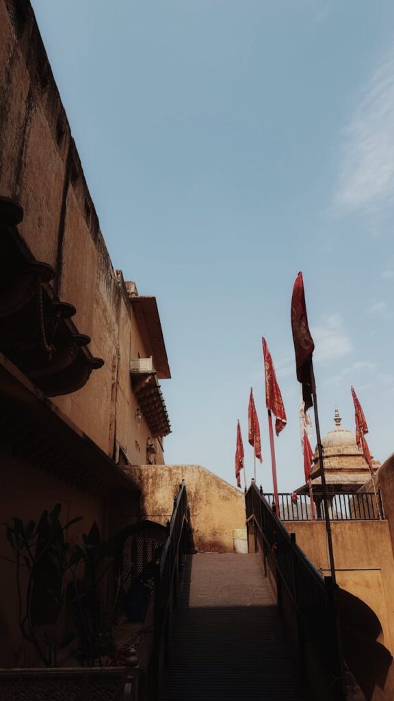 Vibrant Jaipur cityscape with pink-hued palaces and bustling streets showcasing India's Golden Triangle heritage.