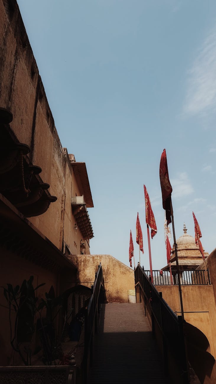 Vibrant Jaipur cityscape with pink-hued palaces and bustling streets showcasing India's Golden Triangle heritage.