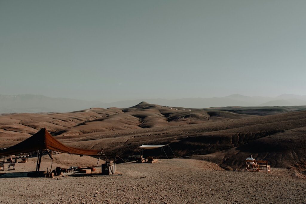 A desert camp in the rocky Agafay Desert, a popular day trip from Marrakech
