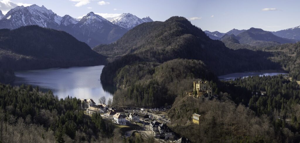 The village of Hohenschwangau and the Alpsee lake below the Bavarian Alps, the starting point for Neuschwanstein