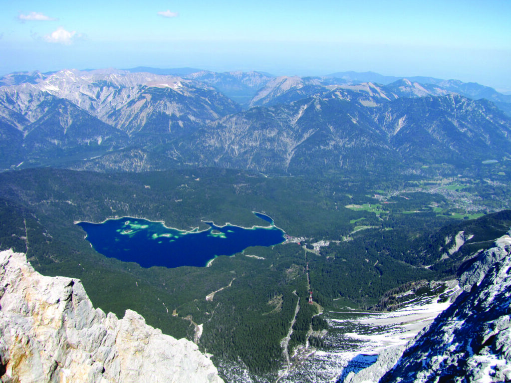 The view from the Zugspitze summit over the Alps and the Eibsee lake, Germany's highest mountain
