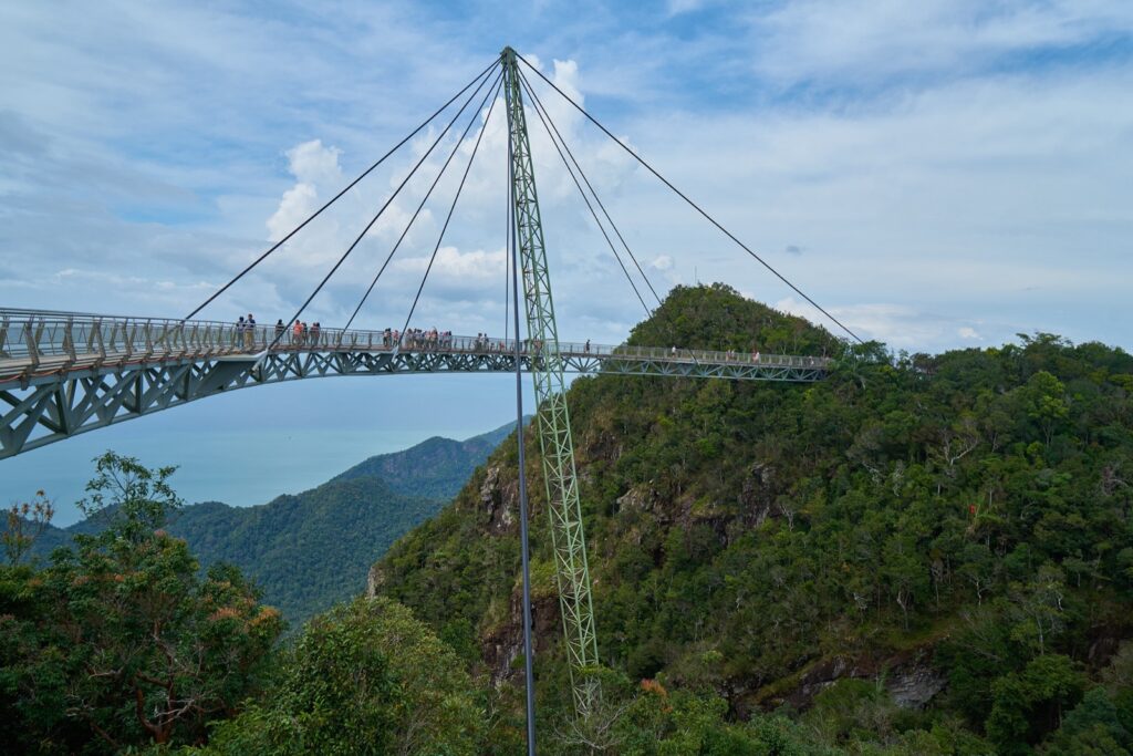 The curved Langkawi SkyBridge above the rainforest on Gunung Mat Cincang, a highlight of any Langkawi travel guide