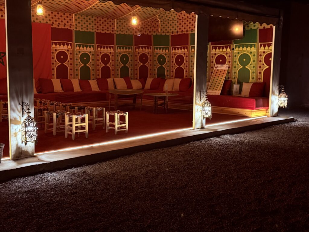 The lantern-lit Moroccan tent at the balloon launch site, where tea and coffee are served before the flight