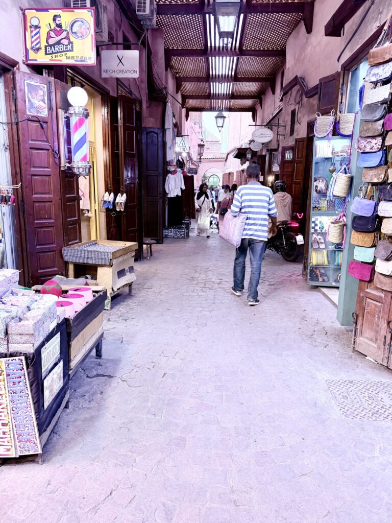 A covered lane lined with shops in the Marrakech souks