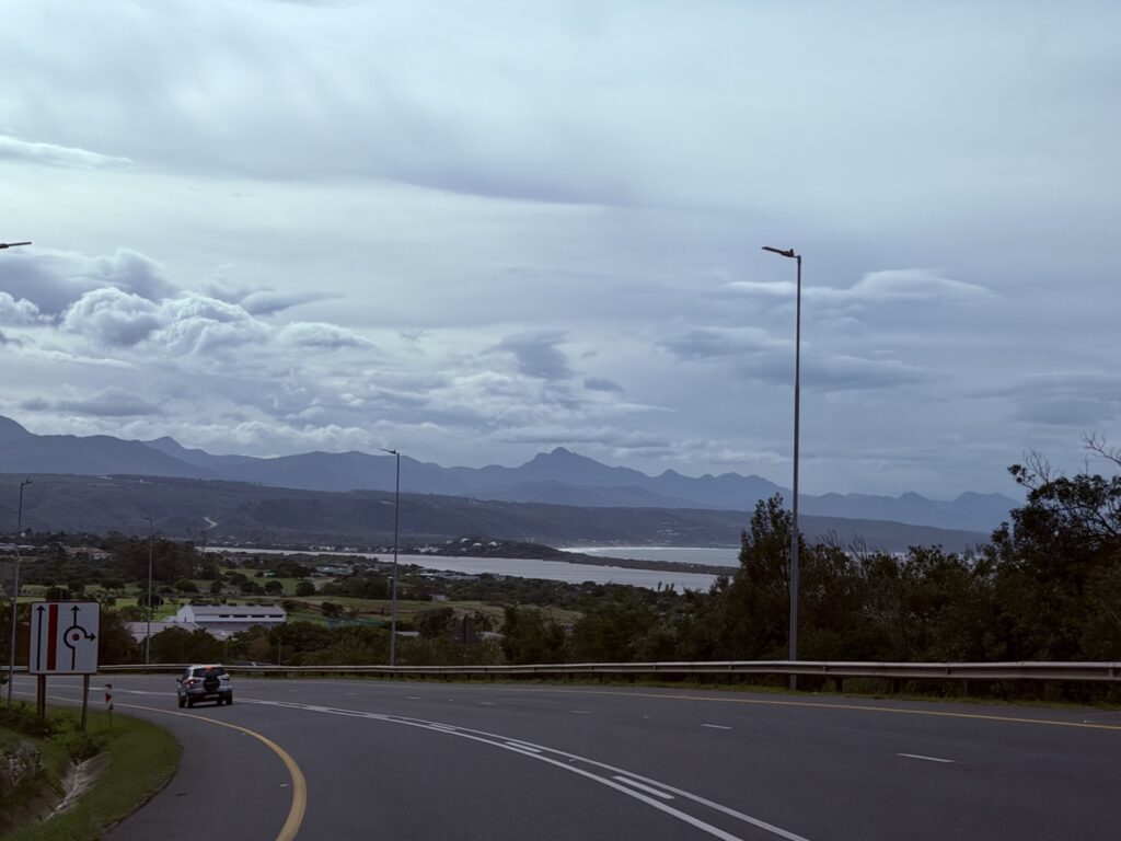 The N2 at Plettenberg Bay, with the lagoon and the Tsitsikamma mountains behind