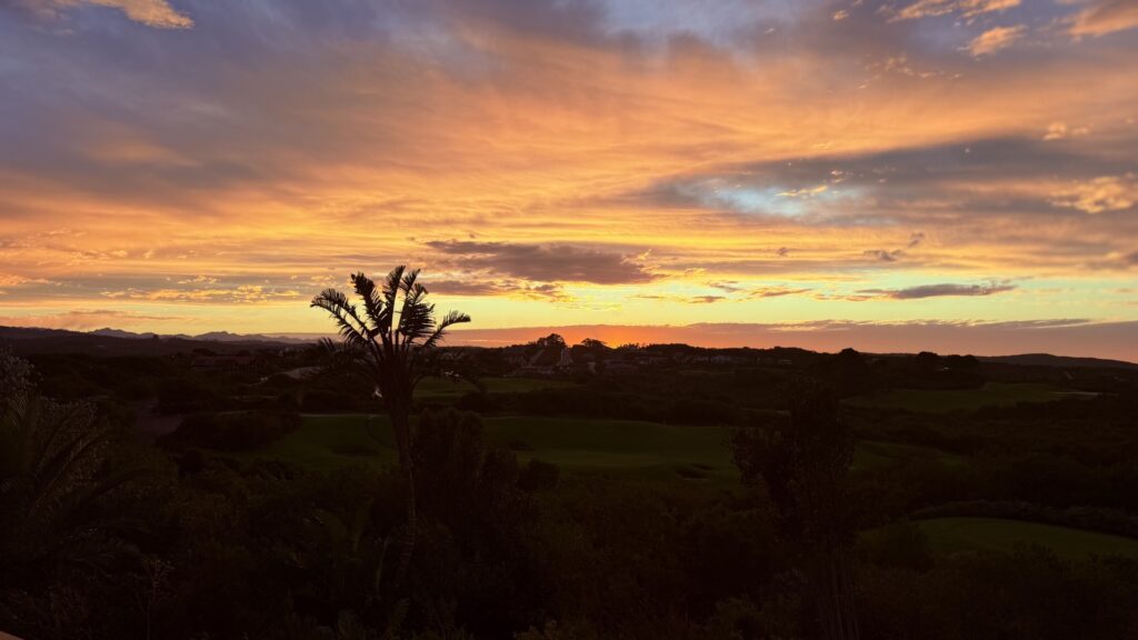 Orange sunrise over the hills from Pezula on Knysna's Eastern Head